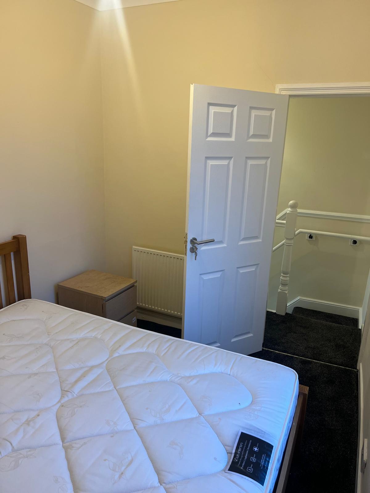 Finished bedroom overlooking the landing
