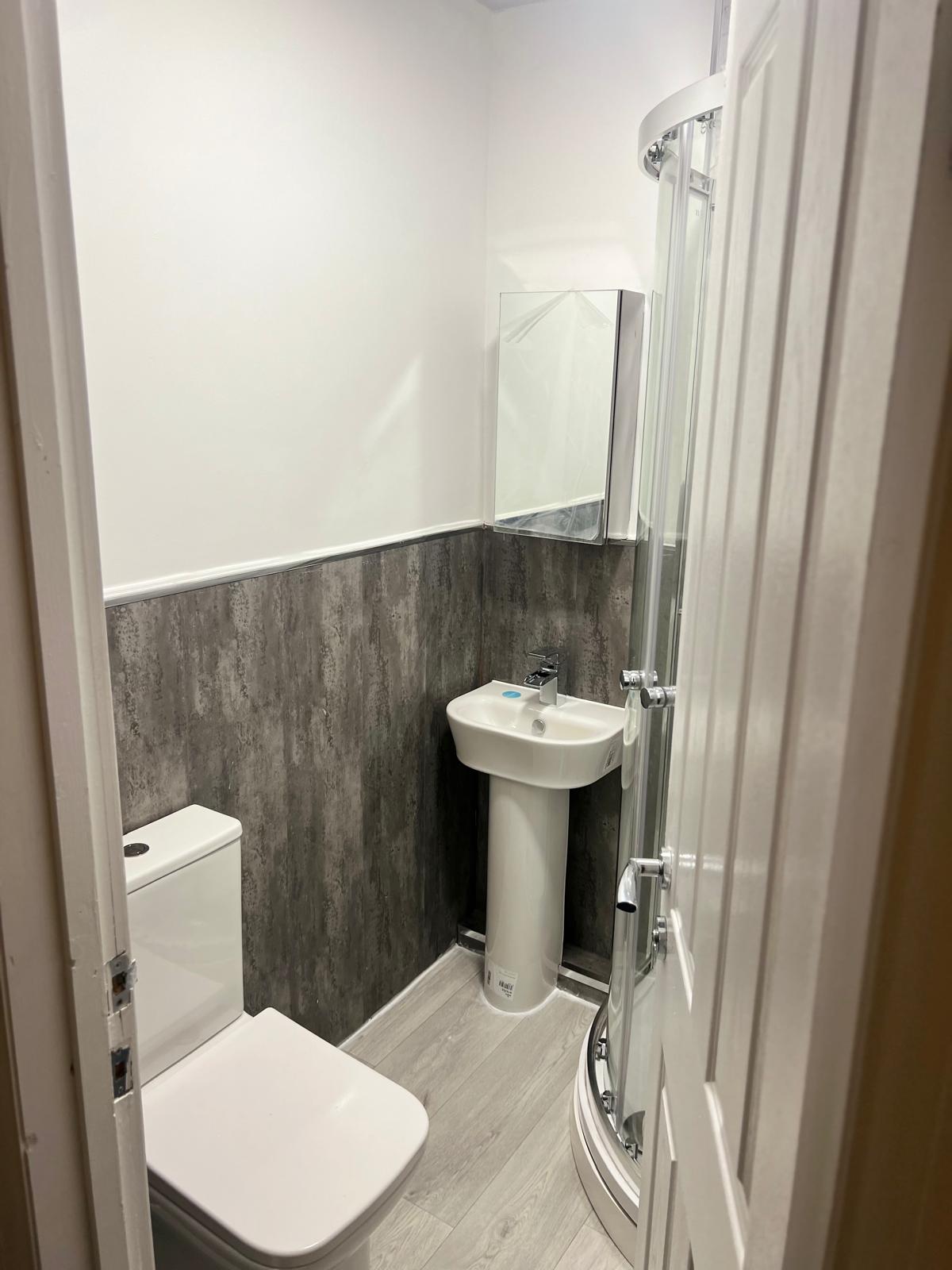 Completed shower room viewed from the landing