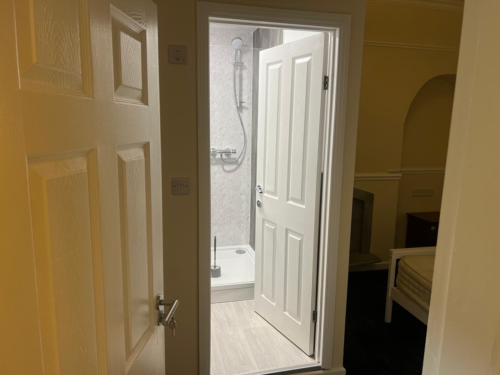 New shower room accessed from the converted bedroom