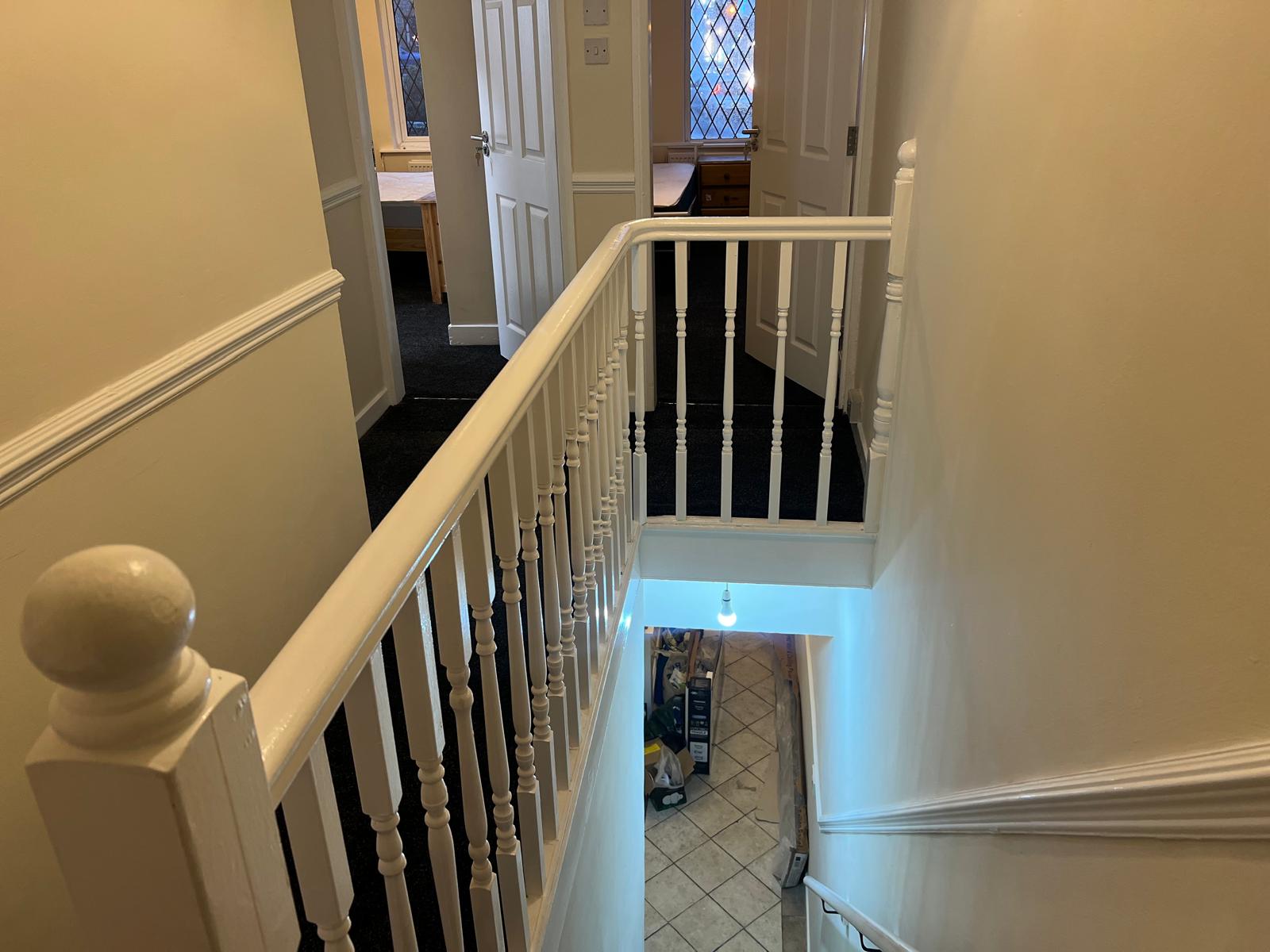 Refreshed first-floor landing serving the converted bedrooms